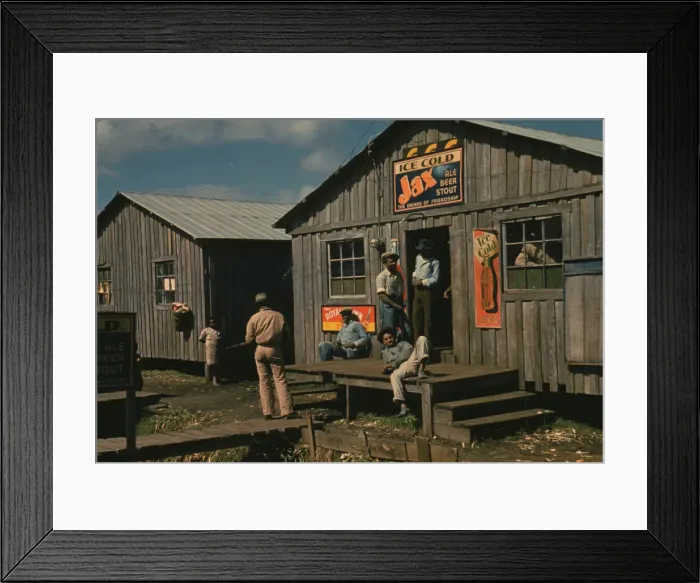 Framed Print : Living quarters and juke joint'for migratory workers, a slack season;Belle Glade, Fla. 1941. Creator: Marion Post Wolcott Framed Print : Living quarters and juke joint'for migratory workers, a slack season;Belle Glade, Fla. 1941. Creator: Marion Post Wolcott
