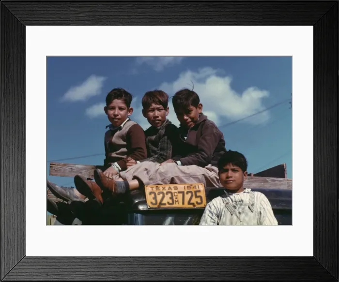 Framed Print : Boys sitting on truck parked at the FSA... labor camp, Robstown, Tex. 1942. Creator: Arthur Rothstein Framed Print : Boys sitting on truck parked at the FSA... labor camp, Robstown, Tex. 1942. Creator: Arthur Rothstein