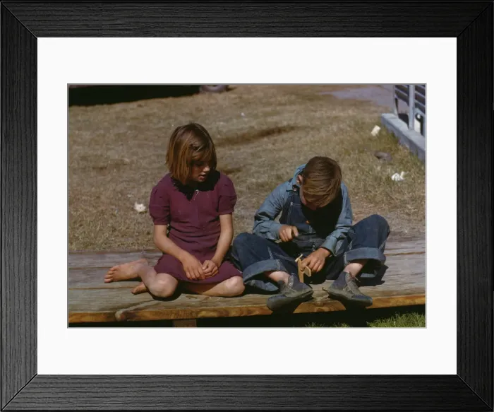 Framed Print : Boy building a model airplane as girl watches, FSA... camp, Robstown, Tex. 1942. Creator: Arthur Rothstein Framed Print : Boy building a model airplane as girl watches, FSA... camp, Robstown, Tex. 1942. Creator: Arthur Rothstein