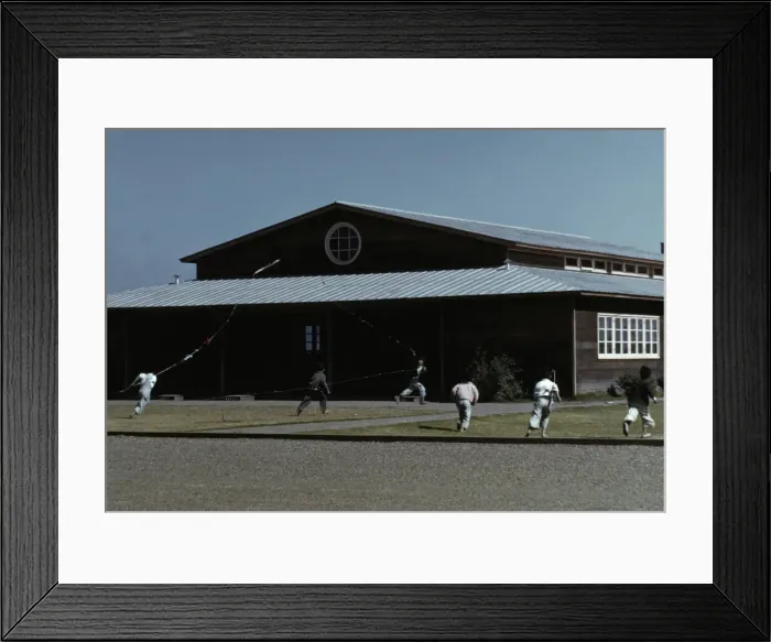 Framed Print : Boys flying a kite in front of community center, FSA... camp, Robstown, Tex. 1942. Creator: Arthur Rothstein Framed Print : Boys flying a kite in front of community center, FSA... camp, Robstown, Tex. 1942. Creator: Arthur Rothstein