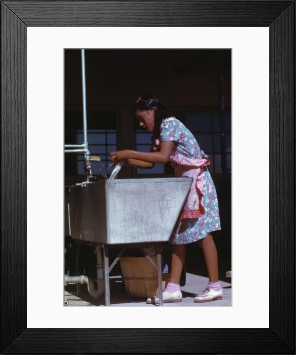 Framed Print : Young woman at the community laundry on Saturday afternoon, FSA... camp, Robstown, Tex. 1942. Creator: Arthur Rothstein Framed Print : Young woman at the community laundry on Saturday afternoon, FSA... camp, Robstown, Tex. 1942. Creator: Arthur Rothstein