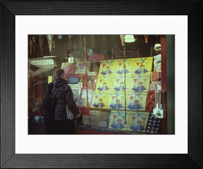 Framed Print : Boy looking at store window display of toys, between 1941 and 1942. Creator: Unknown