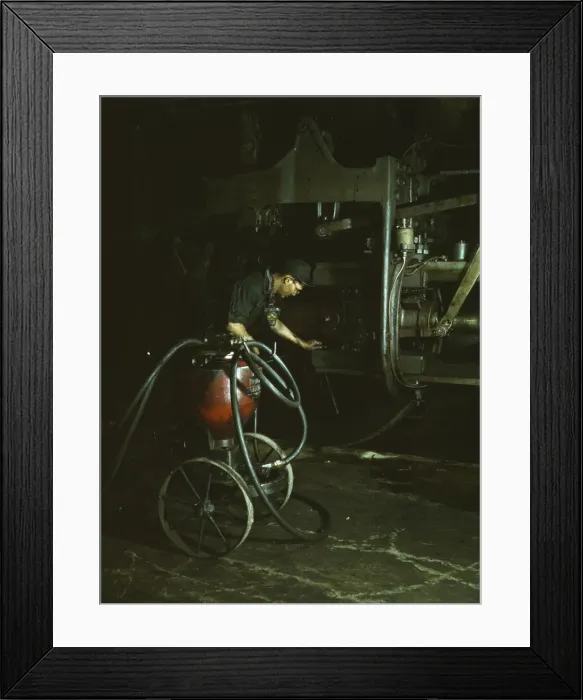 Framed Print : Thomas Madrigal greasing a locomotive in the roundhouse, Rock Island R. R. Blue Island, Ill. 1943. Creator: Jack Delano Framed Print : Thomas Madrigal greasing a locomotive in the roundhouse, Rock Island R. R. Blue Island, Ill. 1943. Creator: Jack Delano