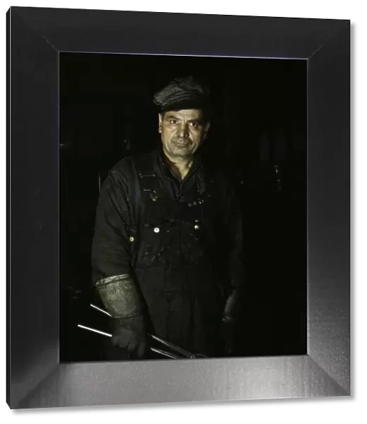 Daniel Anastazia, blacksmiths helper, Rock Island R. R. Blue Island, Ill. 1943. Creator: Jack Delano