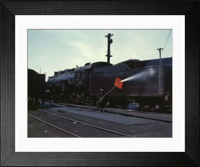 Framed Print : Cleaning an engine near the roundhouse, C. M. St. P. & P. R. R. Bensenville, Ill. 1943. Creator: Jack Delano Framed Print : Cleaning an engine near the roundhouse, C. M. St. P. & P. R. R. Bensenville, Ill. 1943. Creator: Jack Delano