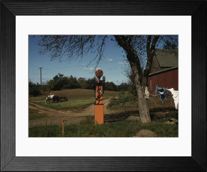 Framed Print : Gas pump with clothesline, barn and horse-drawn wagon in background, between 1941 and 1942. Creator: Unknown Framed Print : Gas pump with clothesline, barn and horse-drawn wagon in background, between 1941 and 1942. Creator: Unknown