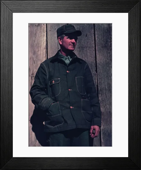 Framed Print : Man in bill cap and dungaree coat, possibly a farmer, between 1941 and 1942. Creator: Unknown Framed Print : Man in bill cap and dungaree coat, possibly a farmer, between 1941 and 1942. Creator: Unknown