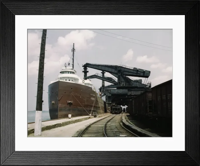 Framed Print : Pennsylvania R.R. ore docks, unloading iron ore from a lake freighter... Cleveland, Ohio, 1943. Creator: Jack Delano Framed Print : Pennsylvania R.R. ore docks, unloading iron ore from a lake freighter... Cleveland, Ohio, 1943. Creator: Jack Delano