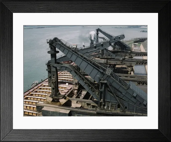 Framed Print : Pennsylvania R.R. ore docks, unloading iron ore from a lake freighter... Cleveland, Ohio, 1943. Creator: Jack Delano Framed Print : Pennsylvania R.R. ore docks, unloading iron ore from a lake freighter... Cleveland, Ohio, 1943. Creator: Jack Delano