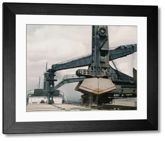 Framed Print : Pennsylvania R.R. ore docks, unloading ore from a lake freighter by means... Cleveland, Ohio, 1943. Creator: Jack Delano Framed Print : Pennsylvania R.R. ore docks, unloading ore from a lake freighter by means... Cleveland, Ohio, 1943. Creator: Jack Delano