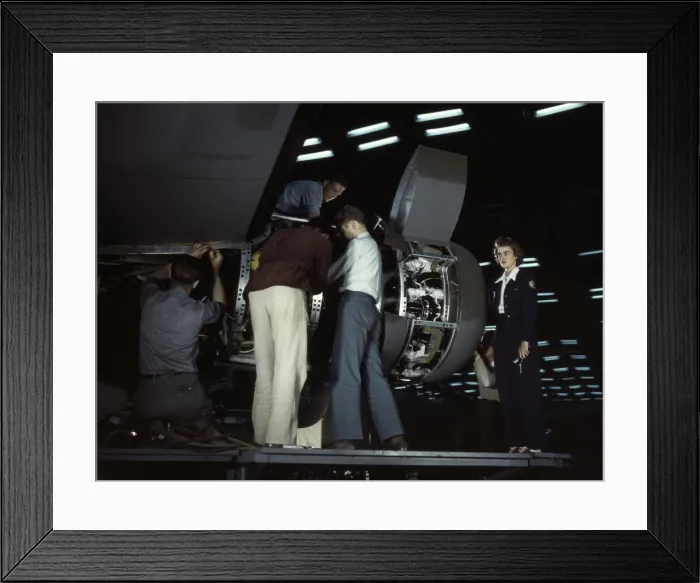 Framed Print : Installing an engine at the Consolidated Aircraft Corporation plant, Fort Worth, Texas, 1942. Creator: Howard Hollem Framed Print : Installing an engine at the Consolidated Aircraft Corporation plant, Fort Worth, Texas, 1942. Creator: Howard Hollem