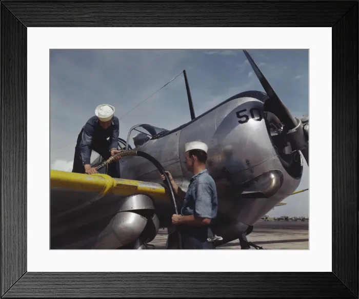 Framed Print : Feeding an SNC advanced training plane its essential supply of gas... Corpus Christi, Texas, 1942. Creator: Howard Hollem Framed Print : Feeding an SNC advanced training plane its essential supply of gas... Corpus Christi, Texas, 1942. Creator: Howard Hollem
