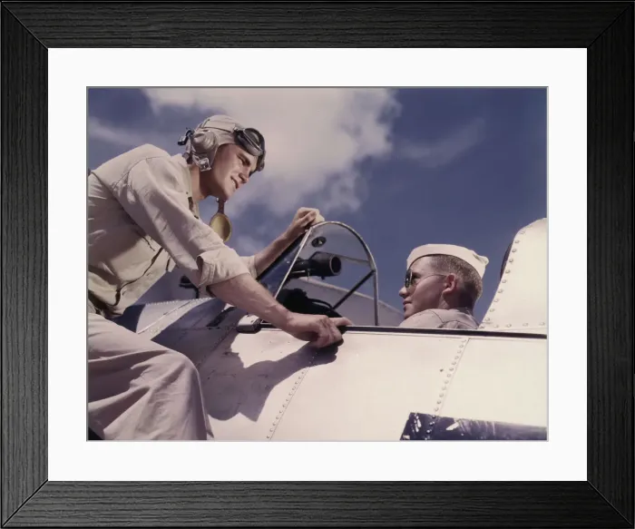 Framed Print : Ensign Noressey and Cadet Thenics at the Naval Air base, Corpus Christi, Texas, 1942. Creator: Howard Hollem Framed Print : Ensign Noressey and Cadet Thenics at the Naval Air base, Corpus Christi, Texas, 1942. Creator: Howard Hollem