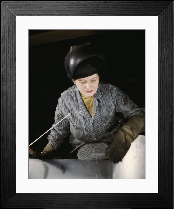 Framed Print : Enola O Connell, age 32, widow and mother of one child... Heil and Co. Milwaukee, Wisc. 1943. Creator: Howard Hollem Framed Print : Enola O Connell, age 32, widow and mother of one child... Heil and Co. Milwaukee, Wisc. 1943. Creator: Howard Hollem