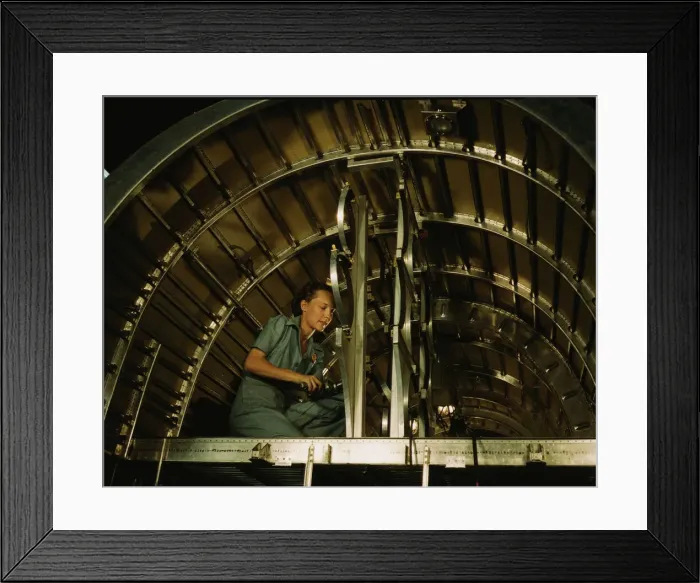 Framed Print : Installing oxygen flask racks above the flight... Consolidated Aircraft... Fort Worth, Texas, 1942. Creator: Howard Hollem Framed Print : Installing oxygen flask racks above the flight... Consolidated Aircraft... Fort Worth, Texas, 1942. Creator: Howard Hollem