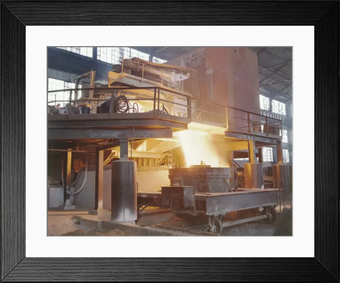Framed Print : White-hot steel pours like water from a 35-ton electric furnace, Allegheny Ludlum Steele... (1941?) Creator: Alfred T Palmer Framed Print : White-hot steel pours like water from a 35-ton electric furnace, Allegheny Ludlum Steele... (1941?) Creator: Alfred T Palmer