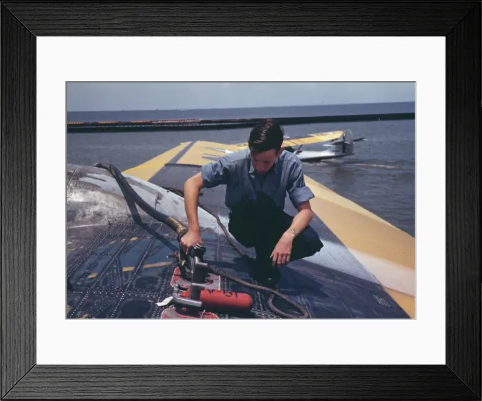 Framed Print : A sailor mechanic refueling a plane at the Naval Air Base, Corpus Christi, Texas, 1942. Creator: Howard Hollem Framed Print : A sailor mechanic refueling a plane at the Naval Air Base, Corpus Christi, Texas, 1942. Creator: Howard Hollem