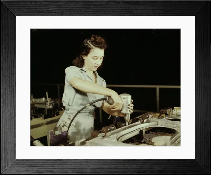 Framed Print : Drilling a wing bulkhead for a transport plane at the Consolidated Air... Fort Worth, Texas, 1942. Creator: Howard Hollem Framed Print : Drilling a wing bulkhead for a transport plane at the Consolidated Air... Fort Worth, Texas, 1942. Creator: Howard Hollem