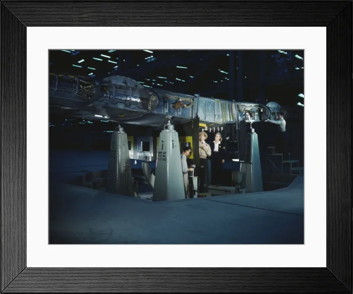 Framed Print : Working on wing of Consolidated Liberator... Consolidated Aircraft Corp. Fort Worth, Texas, 1942. Creator: Howard Hollem Framed Print : Working on wing of Consolidated Liberator... Consolidated Aircraft Corp. Fort Worth, Texas, 1942. Creator: Howard Hollem