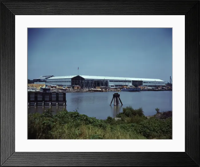 Framed Print : Higgins Industries, Inc. New Orleans, La. makes torpedo boats and other boats for the Navy, 1942. Creator: Howard Hollem Framed Print : Higgins Industries, Inc. New Orleans, La. makes torpedo boats and other boats for the Navy, 1942. Creator: Howard Hollem
