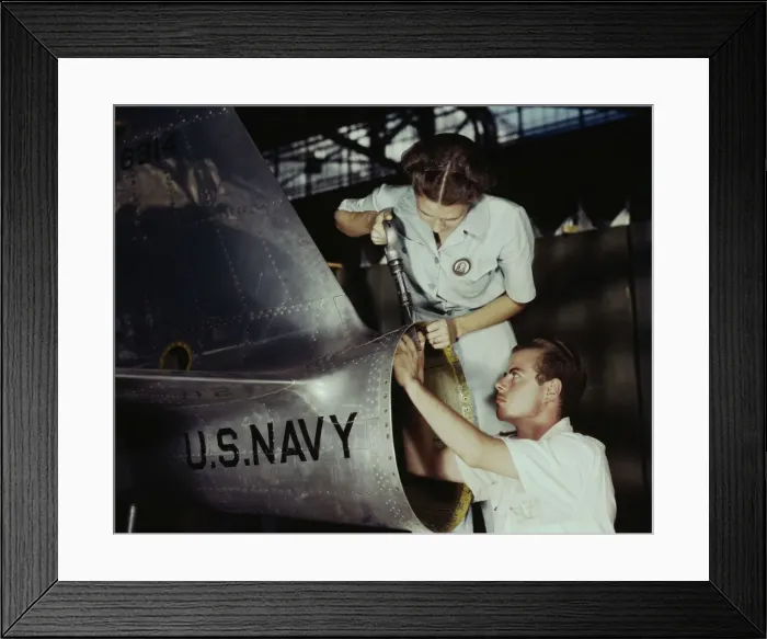 Framed Print : Mrs. Virginia Davis, a riveter in the assembly and repair department of the Naval air base... 1942. Creator: Howard Hollem Framed Print : Mrs. Virginia Davis, a riveter in the assembly and repair department of the Naval air base... 1942. Creator: Howard Hollem