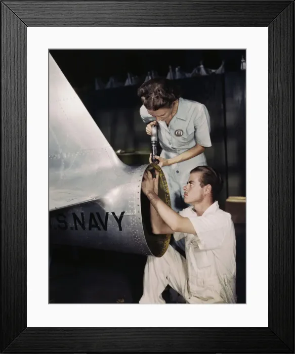 Framed Print : Mrs. Virginia Davis, a riveter in the assembly and repair department of the Naval Air Base... 1942. Creator: Howard Hollem Framed Print : Mrs. Virginia Davis, a riveter in the assembly and repair department of the Naval Air Base... 1942. Creator: Howard Hollem