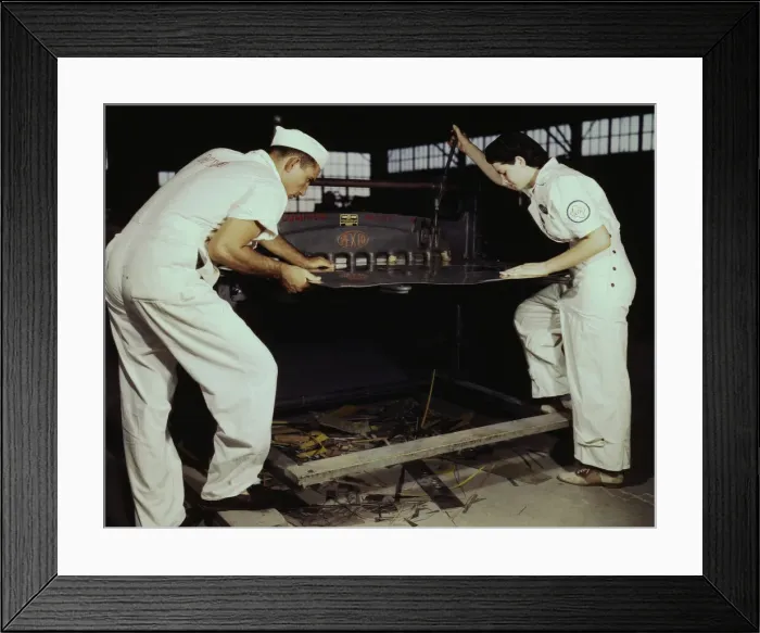 Framed Print : Learning to work a cutting machine, these two NYA employees... Corpus Christi, Texas, 1942. Creator: Howard Hollem Framed Print : Learning to work a cutting machine, these two NYA employees... Corpus Christi, Texas, 1942. Creator: Howard Hollem