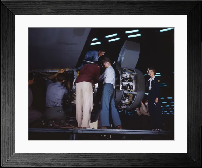 Framed Print : Installing an engine at the Consolidated Aircraft Corporation plant, Fort Worth, Texas, 1942. Creator: Howard Hollem Framed Print : Installing an engine at the Consolidated Aircraft Corporation plant, Fort Worth, Texas, 1942. Creator: Howard Hollem