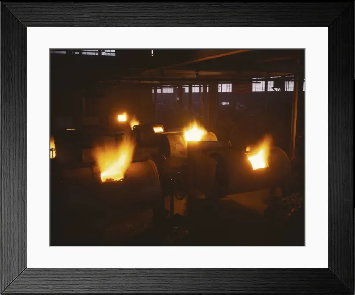Framed Print : A battery of 1, 000 and 2, 000 pound furnaces roaring threats to... Aluminum Industries Inc. 1942. Creator: Alfred T Palmer Framed Print : A battery of 1, 000 and 2, 000 pound furnaces roaring threats to... Aluminum Industries Inc. 1942. Creator: Alfred T Palmer