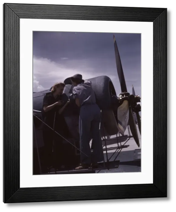 Framed Print : Bowen and Olsen, a riveter and her supervisor, in the... Naval Air Base, Corpus Christi, Texas, 1942. Creator: Howard Hollem Framed Print : Bowen and Olsen, a riveter and her supervisor, in the... Naval Air Base, Corpus Christi, Texas, 1942. Creator: Howard Hollem