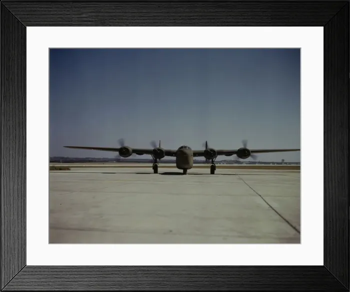 Framed Print : A C-87 transport plane, just off the assembly... Consolidated Aircraft... Fort Worth, Texas, 1942. Creator: Howard Hollem Framed Print : A C-87 transport plane, just off the assembly... Consolidated Aircraft... Fort Worth, Texas, 1942. Creator: Howard Hollem