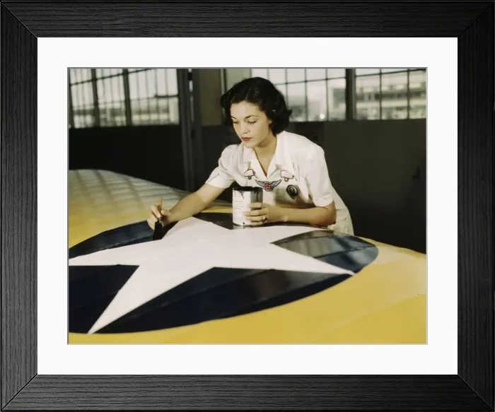 Framed Print : Painting the American insignia on airplane wings is a job... Air Base, Corpus Christi, Texas, 1942. Creator: Howard Hollem Framed Print : Painting the American insignia on airplane wings is a job... Air Base, Corpus Christi, Texas, 1942. Creator: Howard Hollem