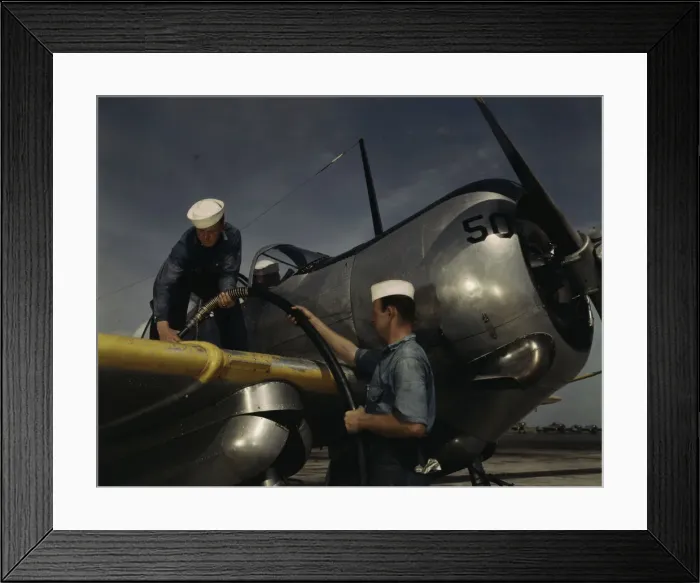 Framed Print : Feeding an SNC advanced training plane its essential supply of gas... Corpus Christi, Texas, 1942. Creator: Howard Hollem Framed Print : Feeding an SNC advanced training plane its essential supply of gas... Corpus Christi, Texas, 1942. Creator: Howard Hollem