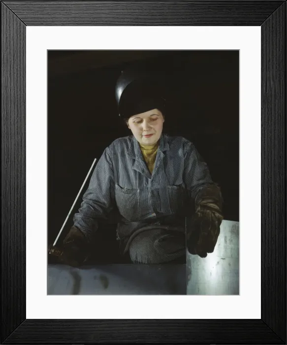 Framed Print : Enola O Connell, age 32, widow and mother of one child... Heil and Co. Milwaukee, Wisconsin, 1943. Creator: Howard Hollem Framed Print : Enola O Connell, age 32, widow and mother of one child... Heil and Co. Milwaukee, Wisconsin, 1943. Creator: Howard Hollem