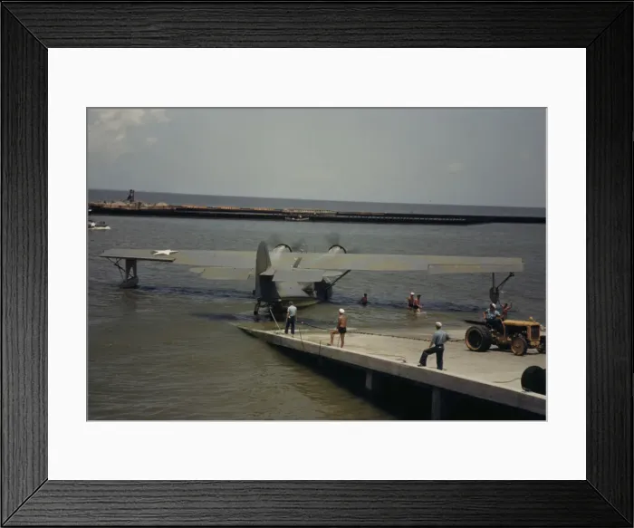 Framed Print : Working with a sea-plane at the Naval Air Base, Corpus Christi, Texas, 1942. Creator: Howard Hollem Framed Print : Working with a sea-plane at the Naval Air Base, Corpus Christi, Texas, 1942. Creator: Howard Hollem