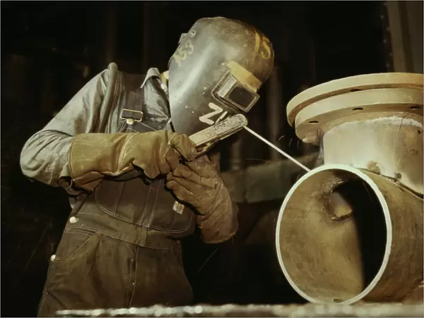 Welder making boilers for a ship, Combustion Engineering Co. Chattanooga, Tenn. 1942. Creator: Alfred T Palmer