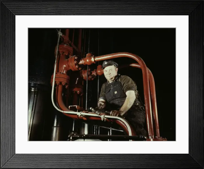 Framed Print : Maintenance mechanic in largest coal press... Combustion Engineering Co. Chattanooga, Tenn. 1942. Creator: Alfred T Palmer Framed Print : Maintenance mechanic in largest coal press... Combustion Engineering Co. Chattanooga, Tenn. 1942. Creator: Alfred T Palmer