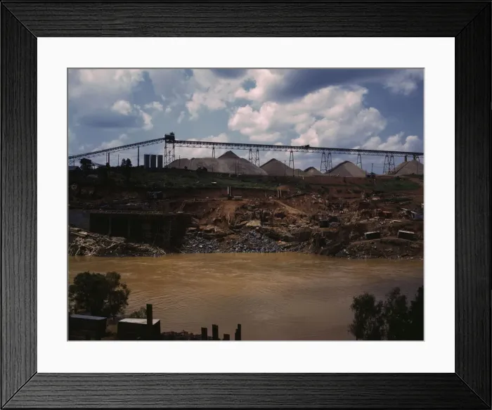 Framed Print : Above the construction work, the aggregate storage pile which... Fort Loudoun Dam, Tenn. 1942. Creator: Alfred T Palmer Framed Print : Above the construction work, the aggregate storage pile which... Fort Loudoun Dam, Tenn. 1942. Creator: Alfred T Palmer