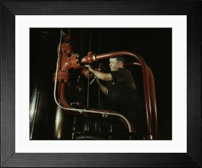 Framed Print : Maintenance man at the Combustion Engineering Co. working at the largest... Chattanooga, Tenn. 1942. Creator: Alfred T Palmer Framed Print : Maintenance man at the Combustion Engineering Co. working at the largest... Chattanooga, Tenn. 1942. Creator: Alfred T Palmer