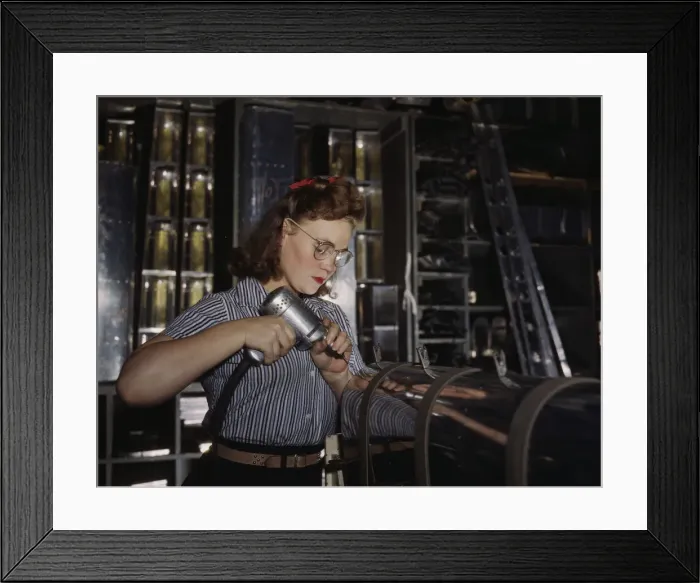 Framed Print : Operating a hand drill at the North American Aviation, Inc. a woman is in the control... 1942. Creator: Alfred T Palmer Framed Print : Operating a hand drill at the North American Aviation, Inc. a woman is in the control... 1942. Creator: Alfred T Palmer