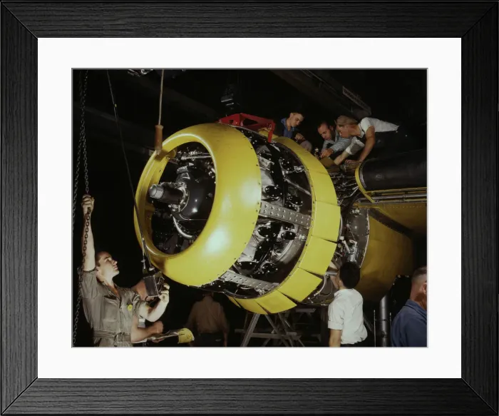 Framed Print : Mounting motor on a Fairfax B-25 bomber, North American Aviation, Inc. Inglewood, Calif. 1942. Creator: Alfred T Palmer Framed Print : Mounting motor on a Fairfax B-25 bomber, North American Aviation, Inc. Inglewood, Calif. 1942. Creator: Alfred T Palmer