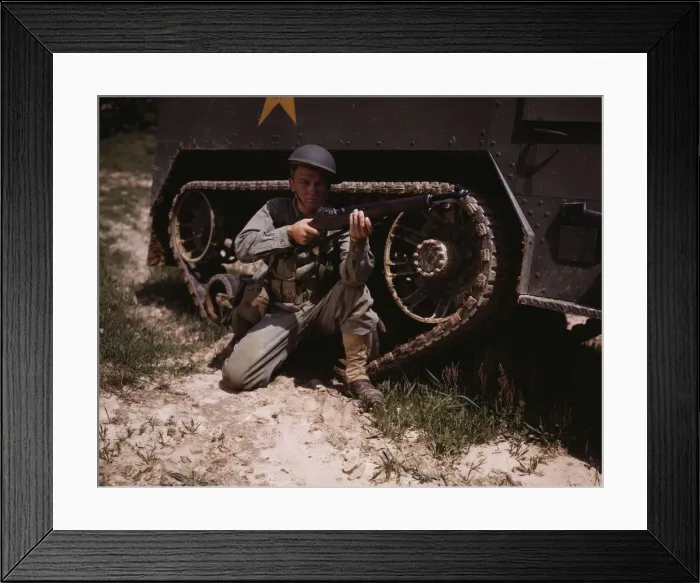 Framed Print : A young soldier of the armored forces holds and sights his Garand rifle like... Fort Knox, Ky, 1942 Creator: Alfred T Palmer Framed Print : A young soldier of the armored forces holds and sights his Garand rifle like... Fort Knox, Ky, 1942 Creator: Alfred T Palmer