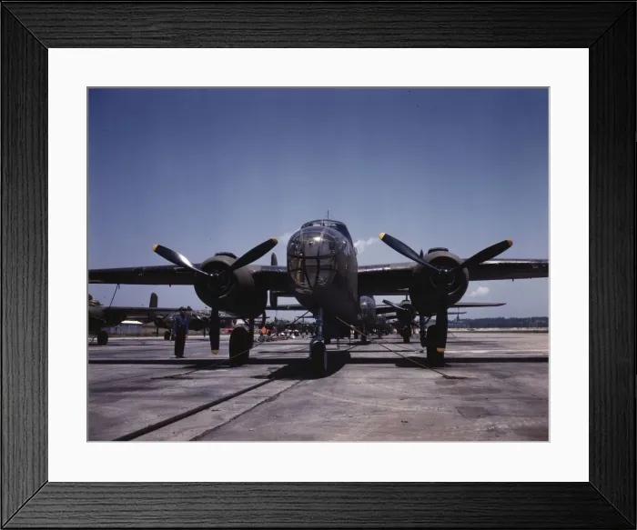 Framed Print : B-25 bombers on the outdoor assembly line at North American Aviation... Kansas City, Kansas, 1942. Creator: Alfred T Palmer Framed Print : B-25 bombers on the outdoor assembly line at North American Aviation... Kansas City, Kansas, 1942. Creator: Alfred T Palmer