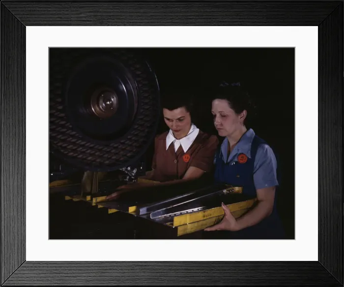 Framed Print : Punching rivet holes in a frame member for a B-25 bomber... North American Aviation, Inc. CA, 1942. Creator: Alfred T Palmer Framed Print : Punching rivet holes in a frame member for a B-25 bomber... North American Aviation, Inc. CA, 1942. Creator: Alfred T Palmer