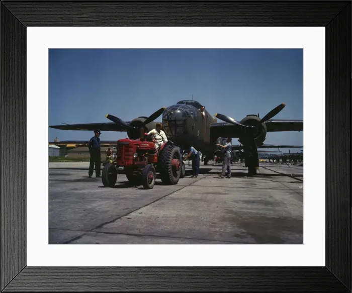 Framed Print : B-25 bomber planes at the North American Aviation, Incorporated... Kansas City, Kansas, 1942. Creator: Alfred T Palmer Framed Print : B-25 bomber planes at the North American Aviation, Incorporated... Kansas City, Kansas, 1942. Creator: Alfred T Palmer