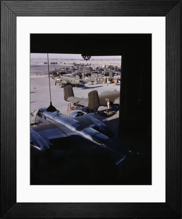 Framed Print : Another North American B-25 bomber rolls off the final assembly line to join other ships... 1942. Creator: Alfred T Palmer Framed Print : Another North American B-25 bomber rolls off the final assembly line to join other ships... 1942. Creator: Alfred T Palmer