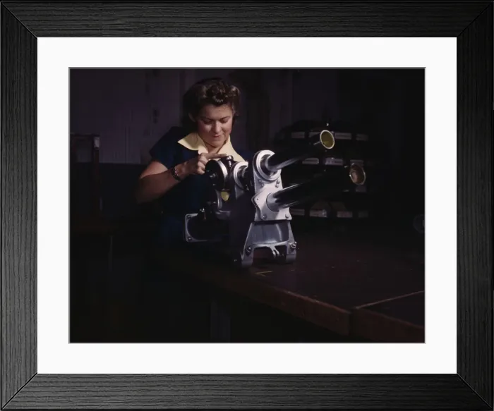 Framed Print : A young woman employee of North American Aviation, Incorporated... Inglewood, Calif. 1942. Creator: Alfred T Palmer Framed Print : A young woman employee of North American Aviation, Incorporated... Inglewood, Calif. 1942. Creator: Alfred T Palmer