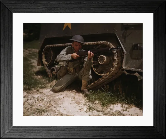 Framed Print : A young soldier of the armored forces holds and sights his Garand rifle... Fort Knox, Ky, 1942. Creator: Alfred T Palmer Framed Print : A young soldier of the armored forces holds and sights his Garand rifle... Fort Knox, Ky, 1942. Creator: Alfred T Palmer