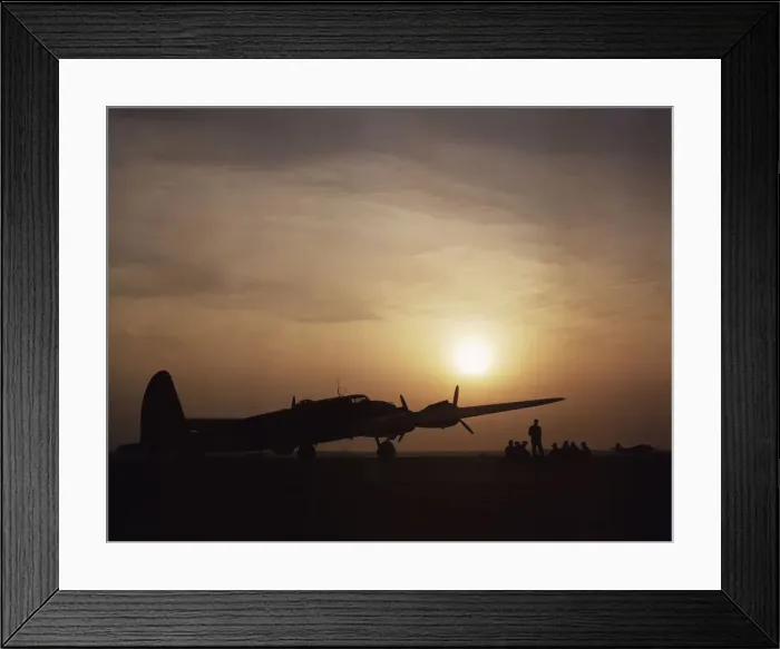 Framed Print : Sunset silhouette of flying fortress, Langley Field, Va. 1942. Creator: Alfred T Palmer Framed Print : Sunset silhouette of flying fortress, Langley Field, Va. 1942. Creator: Alfred T Palmer