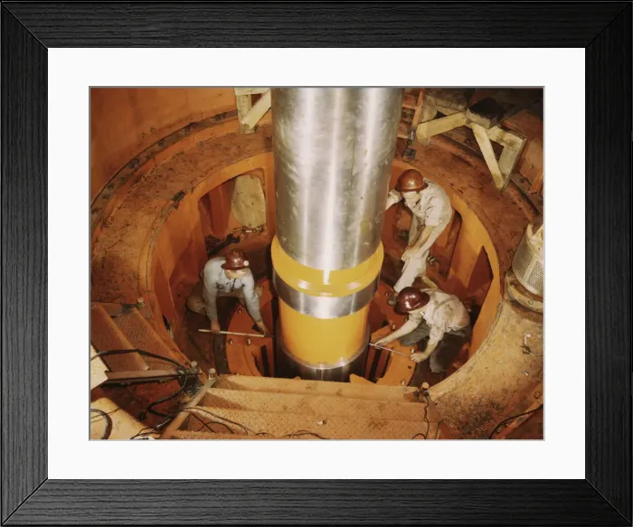 Framed Print : Checking the alignment of a turbine shaft at the top of the guide... Watts Bar Dam, Tenn. 1942. Creator: Alfred T Palmer Framed Print : Checking the alignment of a turbine shaft at the top of the guide... Watts Bar Dam, Tenn. 1942. Creator: Alfred T Palmer